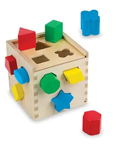 13. Melissa & Doug Shape Sorting Cube - Classic Wooden Toy With 12 Shapes